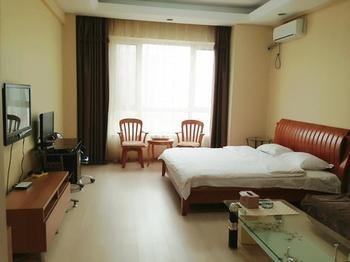 داليان Shangfang Port View Hotel Apartment المظهر الخارجي الصورة