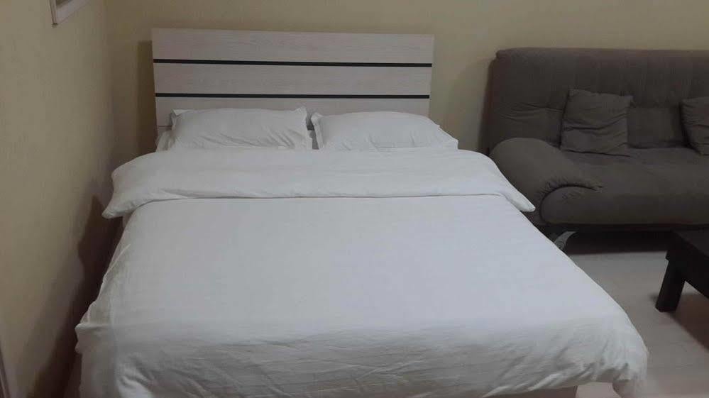 داليان Shangfang Port View Hotel Apartment المظهر الخارجي الصورة